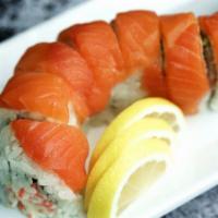 Alaska Roll · In: crabmeat, avocado / out: salmon on top, ponzu sauce. This item may contain raw or underc...