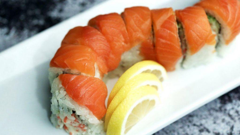 Alaska Roll · In: crabmeat, avocado / out: salmon on top, ponzu sauce. This item may contain raw or undercooked ingredients or may be cooked to order. Consuming raw or undercooked meats, poultry, seafood, shellfish or eggs may increase your risk of food borne illness.