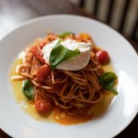 Pesto · spaghetti, sun dried tomato pesto, burrata, tasted pine nuts, cherry tomato