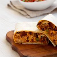 Adobada Burrito · Burrito filled with adobada meat, guacamole, cabbage and pico de gallo.