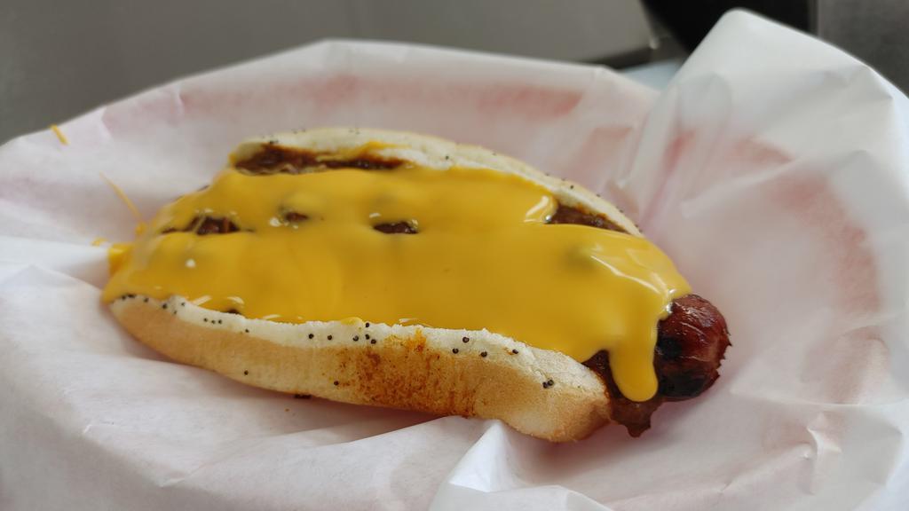 Chili & Cheese Dog · Meat only chili sauce and melted cheddar cheese top this vienna beef hotdog.