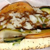 Chili Boat · Chili (no beans) on a poppy seed bun topped with your favorite hot dog toppings