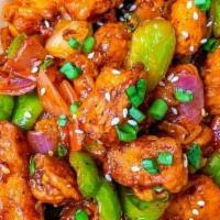 Babycorn Manchurian Dry · Fried Babycorn tossed in Indo Chinese Manchurian sauce with added spices
