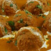 Malai Kofta · Deep-fried veg balls simmered in mint flavor cream sauce with spices.