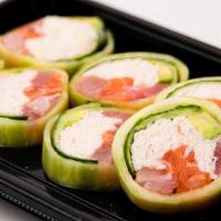 Lollipop Roll · Tuna, salmon, yellowtail, avocado and crab mix, wrapped in cucumber with citrus ponzu sauce ...