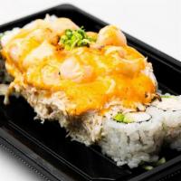 Scallop Dynamite Roll · California Roll, topped with a mixture of baked scallop, crab mix, spicy aioli, eel sauce an...