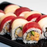 Candy Cane Roll · Spicy crab, shrimp tempura, cucumber, and topped with tuna, escolar, and eel sauce