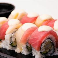 Checker Board Roll · Shrimp tempura, crab mix, and cucumber, topped with fresh tuna, escolar, eel sauce and wasab...