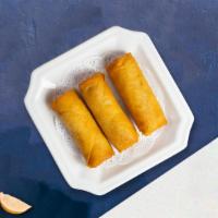 Veggie Rolls · (2 pieces) Crispy egg roll stuffed with beef, egg, celery, cabbage. Served with housemade sw...