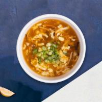 Hot & Sour Soup · Broth with hot and sour spices.