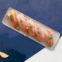 Smoked Salmon Nigiri · Slice of smoked salmon gently pressed over tender cooked rice.