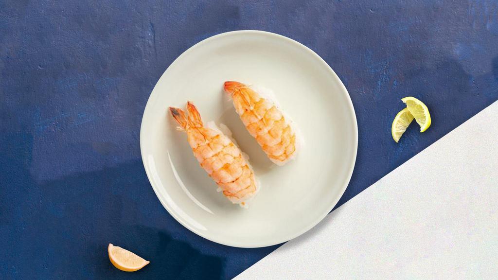 Shrimply Nigiri · Shrimp gently pressed over tender cooked rice.