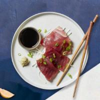 Tuna Terrific Sashimi · Slice of freshTuna sashimi.