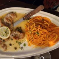 Veal Picatta · Veal cooked in lemon juice, with capers, white wine and butter sauce.