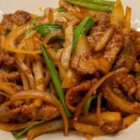 Mongolian Beef · Tender beef with white onion in-house special spicy sauce.