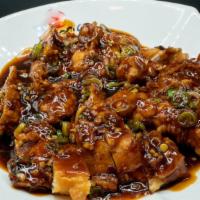House Special Chicken · Crispy deep-fried dark meat chicken with house special sauce.