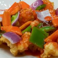 Sweet & Sour Shrimp · Deep-fried shrimp, green pepper, onion & Carrots with sweet & sour sauce.
