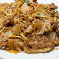 Dry Sautéed Beef Chow Fun · Sliced beef, green onion & bean sprout sautéed with pan-fried flat rice noodle.