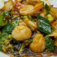 Scallops With Vegetable · Tender jumbo scallops sautéed with variety of vegetable in brown sauce.