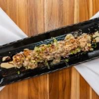 Creamy Toro Yaki Rolls (8 Pieces) · Toro, avocado, cucumber, crab, eel sauce, wasabi dressing, roasted.