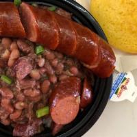 Red Beans & Rice Bowl · Louisiana style slow cooked red beans over rice and topped with a link of andouille. Served ...