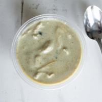 Green Curry Lunch · Green curry paste, bamboo shoots, coconut milk, bell pepper, and Thai basil.