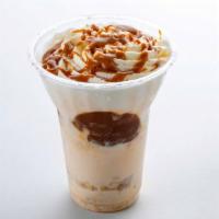 Dulce De Leche · Vanilla ice cream, Alfajores Mexican cookie crumble, real Chantilly cream topped with dulce ...