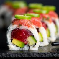 Double Tuna Roll · Tuna, Avocado, Cucumber, White Sesame Seeds, Sushi Rice, Nori, topped with Spicy Tuna and Se...
