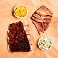 Omg 2 Smoked Meats Combo Lol · Your choice of 2 house smoked meats and 2 sides with cornbread.