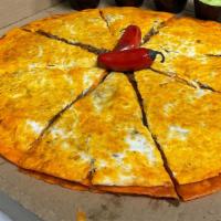 Pizza Birria · 3 layered tortilla pizza, filled with lots of cheese and birria. Comes with sides: onions, c...