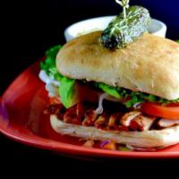 Chicken Sandwich · 6 oz. Boneless, skinless, charbroiled adobo chicken breast served with green leaf lettuce, t...