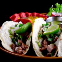 Carnitas Tacos · Slow cooked, simmered, roasted pork, creating a beautiful alternating texture of softness wi...