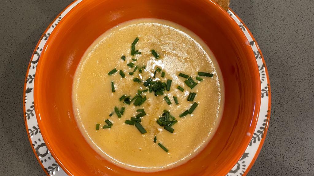 Crawfish Bisque · *Contains shrimp broth. Homemade Creamy Soup made with Louisiana Crawfish, house made shrimp stock & fresh ingredients. Served with French Bread.