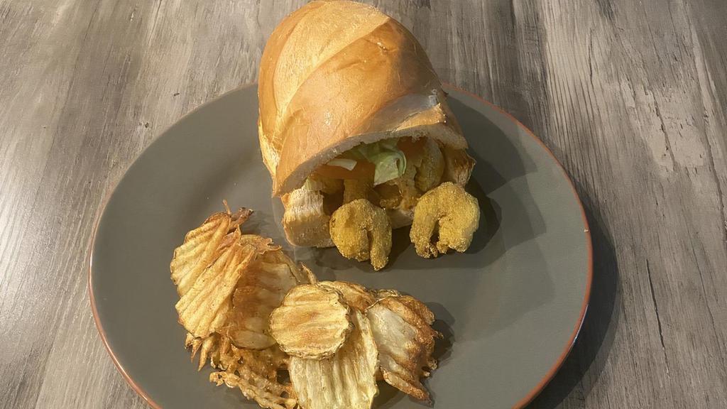 Shrimp Po'Boy · Crispy deep-fried shrimp coated in spicy cornmeal batter served on French bread with scratch made remoulade sauce, fresh lettuce and tomato.  Served with hand cut fries.
