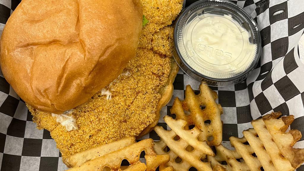 Southern Fried Catfish Sandwich · Crispy Deep-fried Catfish coated in Spicy Cornmeal Batter served on a Brioche Bun with scratch made Tarter Sauce, fresh lettuce & tomato. Served with hand cut fries.