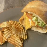 Catfish Po' Boy · Crispy deep-fried catfish coated in spicy cornmeal batter served on French bread with scratc...