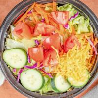 Dinner Salad · Fresh mixed green salad with lettuce, tomato, cucumber, carrots, red cabbage  (only a little...
