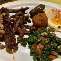 Meat Mezza · Meat. Kafta (ground beef, parsley, onions, and traditional spices), chicken shawarma, falafe...