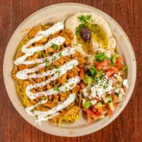 Chicken Shawarma Plate · Chicken marinated with spices. cooked with onion over basmati rice. Served with warm pita br...