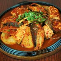 Eundaegu Jorim · Spicy. Black cod with vegetables, tofu and fish cakes braised in a spicy soy sauce-based mar...