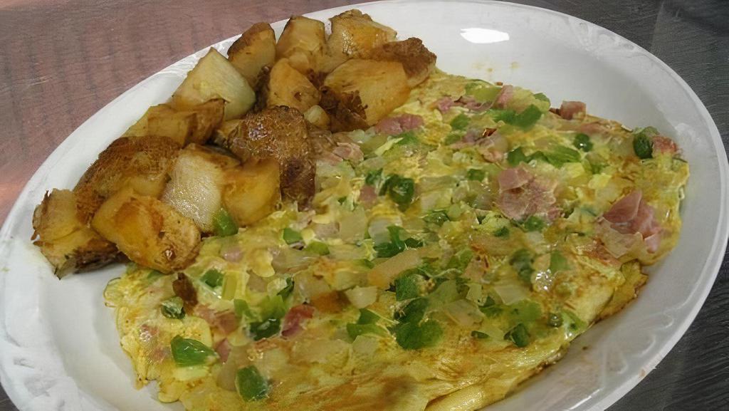 Ham & Cheese Omelette · Honey cured ham with Cheddar cheese.