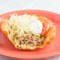 Deluxe Taco Salad · Choose from chicken or beef, served in a crispy flour tortilla shell with lettuce, cheese, t...