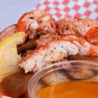 Twin Lobster Rolls · Succulent and sweet lobster meat with celery,green onion, a touch of Cajun and mayo and pick...