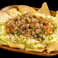 Fili'S Chicken Salad · Corn tortilla chips, grilled chicken, pico de gallo, and lettuce.