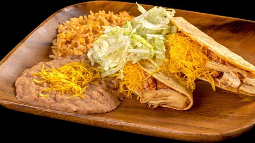 2 Chicken Tacos Combination Plate · Two shredded chicken tacos.