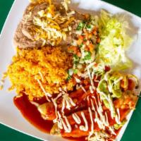 Two Chile Rellenos Combination · With a side of rice and beans.