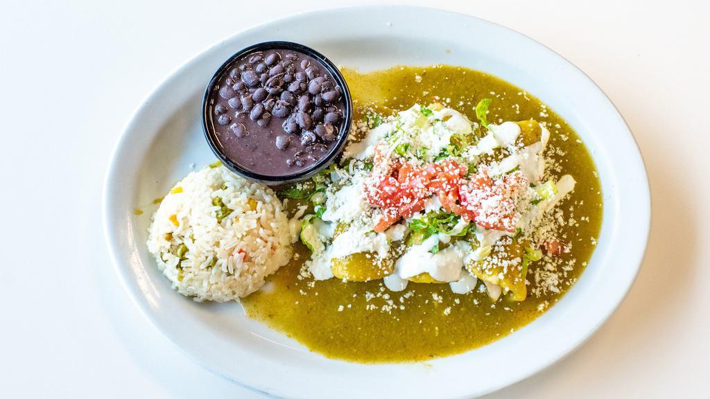 Enchiladas Verdes · With meat and our green tomatillo sauce. Melted pepper jack blend, topped with lettuce, tomatoes, sour cream and queso cotija.