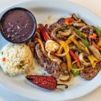 Carne Asada  · Thinly sliced, grilled skirt steak served with red and green peppers, unions, grilled jalape...