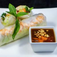 Cuốn/Fresh Spring Rolls · Two rice paper wrapped with fresh vegetables.