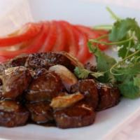 Shaking Beef Cubes · Filet mignon cubes stir fried with garlic butter & onion